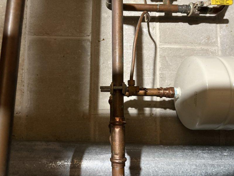 Responded to service call for burner installation and potential humidifier service. Successfully installed new burners in the heating system and verified proper operation through comprehensive testing. Observed significant corrosion and wear on internal components, particularly on the metal tray beneath the burner assembly.