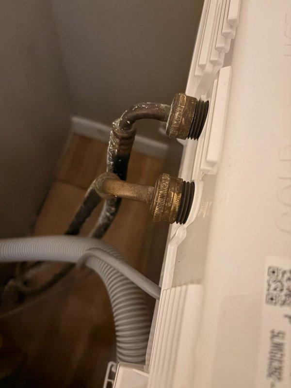 Responded to service call for washing machine experiencing error code due to inadequate water supply. Pressure testing of laundry hose bibbs revealed 70psi at both valves, indicating adequate pressure from supply lines. Diagnosed issue as deteriorated washing machine hoses needing replacement; recommended customer install new stainless braided washing machine hoses to resolve the low pressure problem.