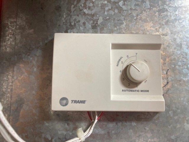 Responded to service call for non-operational Aprilaire humidifier. Diagnostic inspection revealed water feed line obstruction preventing proper water flow. Successfully cleared the feed line, restoring normal water flow over the humidifier pad and returning unit to proper operating condition.