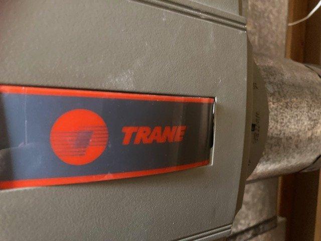 Responded to service call for non-operational Aprilaire humidifier. Diagnostic inspection revealed water feed line obstruction preventing proper water flow. Successfully cleared the feed line, restoring normal water flow over the humidifier pad and returning unit to proper operating condition.