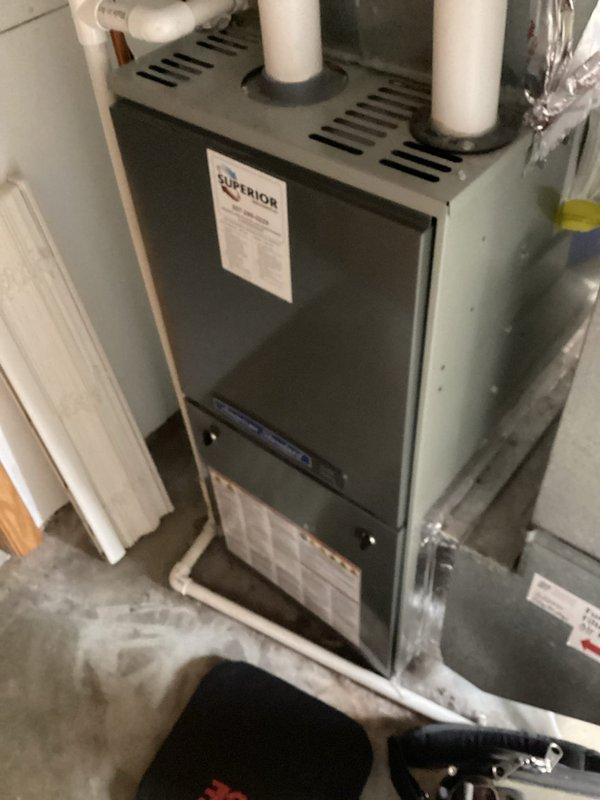 Performed a comprehensive furnace tune-up on a Superior brand gas furnace. System inspection revealed proper installation of PVC exhaust and intake ventilation pipes, secure ductwork connections, and normal operating conditions. Completed standard maintenance procedures with no issues found. Unit is functioning correctly and ready for the heating season.