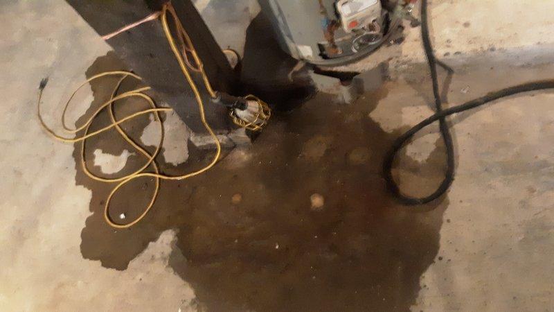 Responded to service call for a leaking shut-off valve from a new refrigerator installation. Upon inspection, located a corroded saddle valve leaking in the basement near the water heater, with additional leakage from the gate valve. Removed the deteriorated valves and installed a new ball valve to resolve the issue and restore proper water flow.