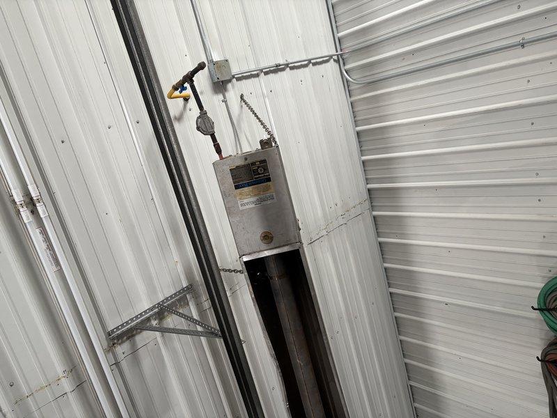 Responded to no-heat complaint at commercial facility. Diagnosed failed fan motors in tube heaters and non-operational blower motor in garage heater. Informed customer contact (Cole) of findings for authorization of necessary repairs.