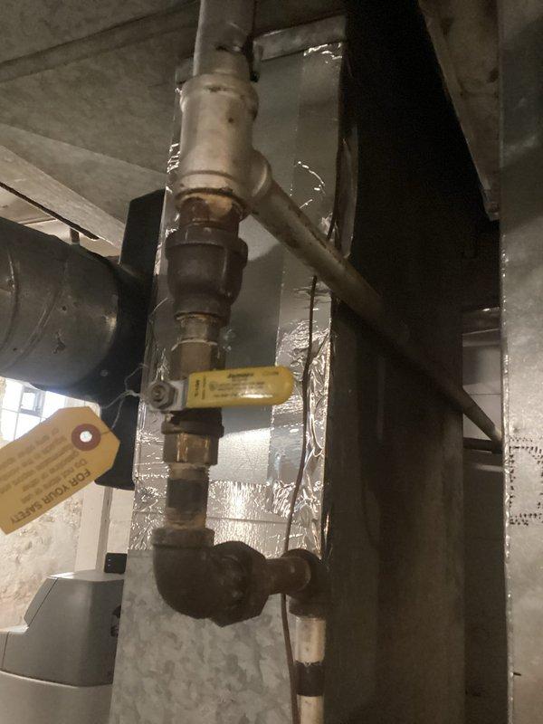 Responded to no heat complaint where furnace was repeatedly shutting down before reaching set temperature with customer reporting gas smell. Diagnostic inspection revealed failed heat exchanger, requiring either repair or replacement of unit. Inspected associated venting and gas line components to confirm source of failure.