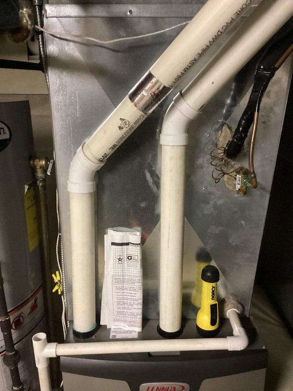 Performed standard tune-up service on a Lennox air handler system. Conducted comprehensive inspection of the furnace unit, Space-Gard air cleaner, and PVC venting assembly. All components were found to be in proper working condition with no operational issues identified.