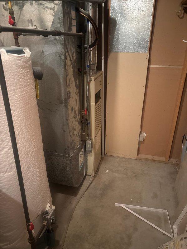 Responded to no-heat call for a 31-year-old Carrier furnace. Upon inspection, found furnace struggling to ignite. Performed maintenance cleaning of spark igniter and flame sensor, which restored ignition, but subsequent testing revealed dangerous levels of carbon monoxide in the exhaust. Red-tagged furnace as unsafe for operation and scheduled project manager consultation for replacement options.