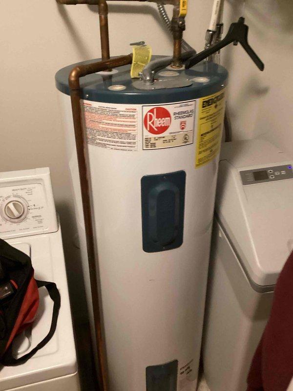 Responded to service call for a Rheem electric water heater providing lukewarm water. Diagnosed issue as tripped thermal cutoff circuit in upper heating element. Reset button was engaged to restore normal operation, and advised customer that hot water should return within one hour. Informed customer that if insufficient heating persists, element replacement would be required.