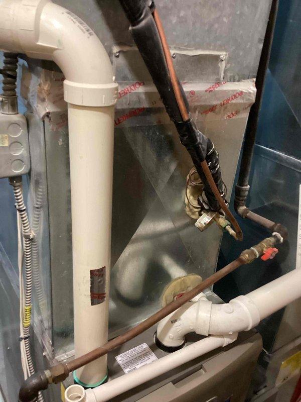 Completed scheduled maintenance on Lennox heating system under PMA. Performed comprehensive tune-up on the furnace unit with KS branding. All components, including PVC ventilation/drainage system and copper line connections, were inspected and functioning properly. System left in clean, well-maintained condition.