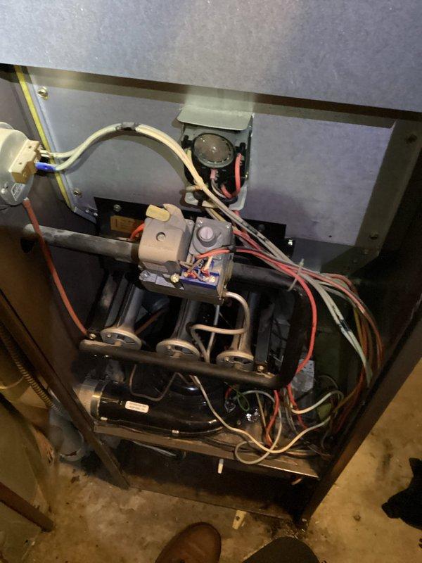 Responded to no heat call where furnace was blowing cold air with indoor temperature at 52°F. Diagnostic testing revealed failed control board. Recommended complete system replacement due to advanced age of equipment and repair costs versus replacement value.