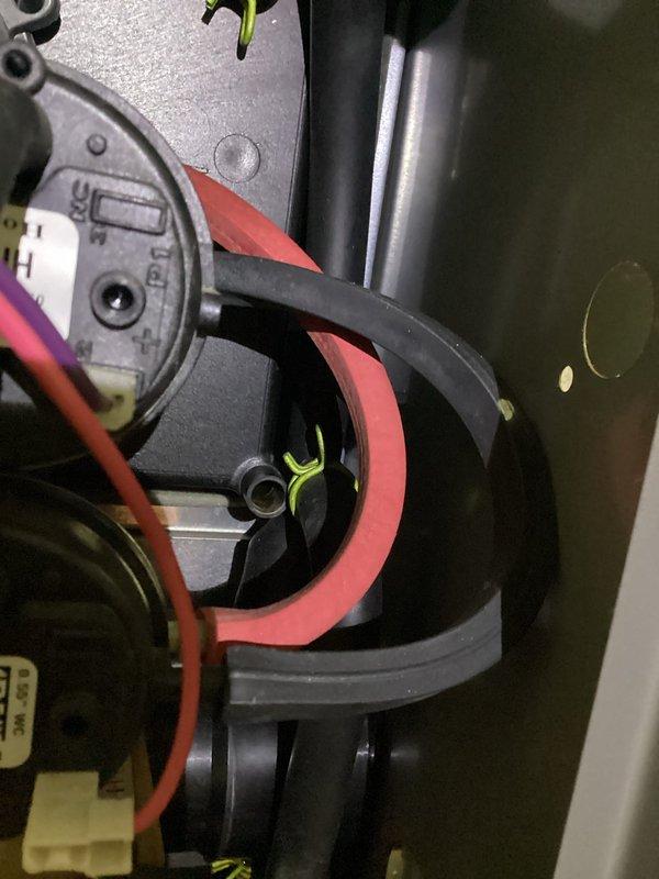 Responded to service call for furnace water leakage. Diagnosed clogged condensate trap causing backup into furnace. Performed thorough cleaning of collector box ports, drain line, and condensate trap by vacuum. Used leaf blower to clear exhaust vent of potential debris causing water accumulation. Issue resolved.