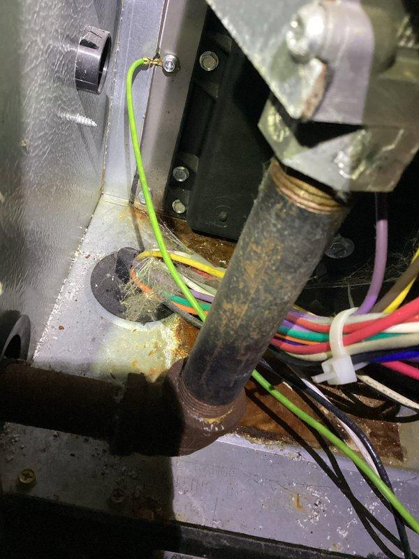 Responded to service call for furnace not maintaining temperature; system unable to reach setpoint of 72°F, maxing out at 66°F. Visual inspection revealed heavily soiled flame sensor. Cleaned flame sensor, restoring proper flame detection and normal furnace operation. Tested system function including amp draw verification with True RMS clamp meter.