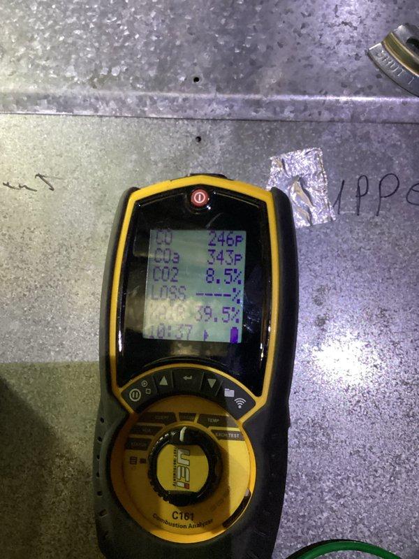 Responded to service call for furnace leaking water. Diagnostic testing with Fieldpiece C161 Combustion Analyzer revealed a failed heat exchanger, confirmed by presence of rusty liquid discharge and water pooling at unit base. Recommended complete system replacement due to unit age and economically unfavorable repair cost comparison.