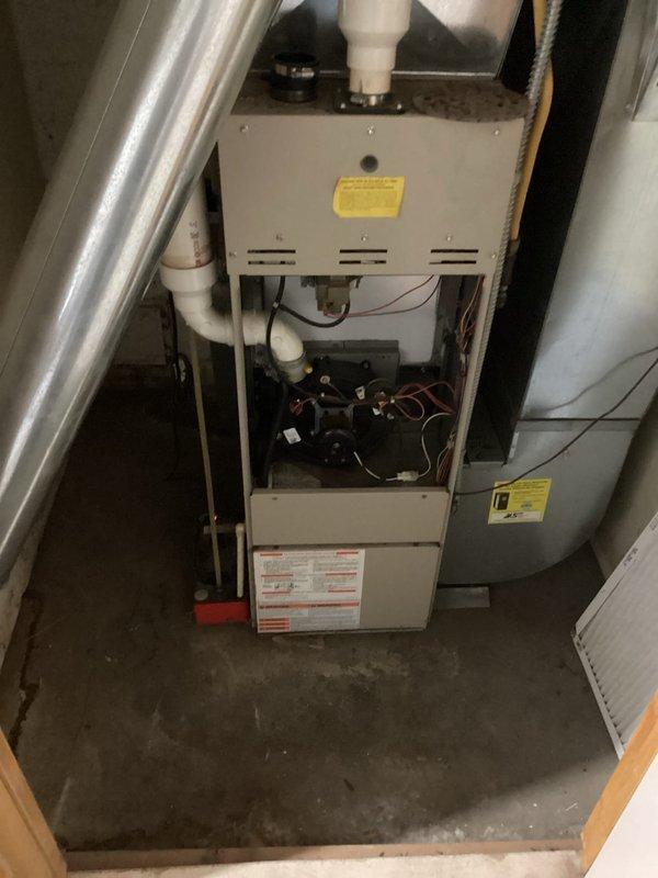 Performed routine maintenance on residential furnace system. Completed comprehensive tune-up of the furnace unit with PVC intake/exhaust venting and inspected drainage assembly. All systems functioning properly with no issues identified.