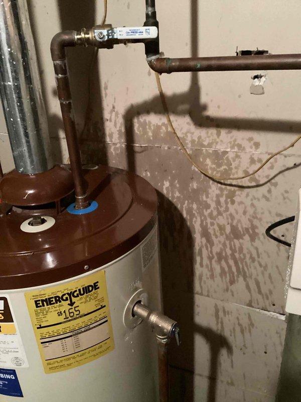 Responded to a callback for a leaking water heater. Successfully replaced the defective T&P valve and installed a new 3/4" ball valve. All systems are now functioning properly with no leaks observed.