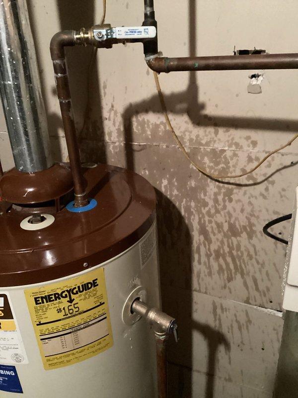 Responded to a callback for a leaking water heater. Successfully replaced the defective T&P valve and installed a new 3/4" ball valve. All systems are now functioning properly with no leaks observed.