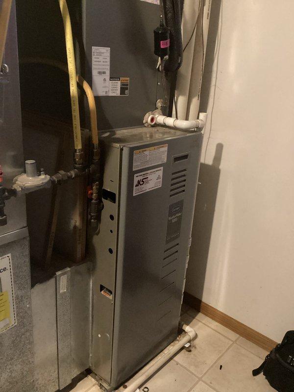 Responded to service call for noisy furnace operation. Diagnosed worn blower bearings causing metal scraping sound during operation. System currently has heat but requires repair. Provided customer with quote for bearing replacement.