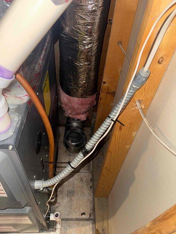 Arrived within scheduled 8-12 window to install supply and return ducting. Installed insulation and two 6" elbows on combustion air supply, properly securing connections with metallic tape as evidenced in utility area installation photos.