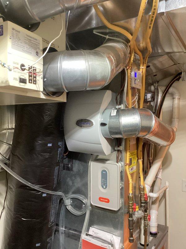 Completed installation of AprilAire humidifier on residential HVAC system. Connected unit to existing ductwork using proper sealing techniques and verified all electrical connections. System was successfully tested and is operating within normal parameters.