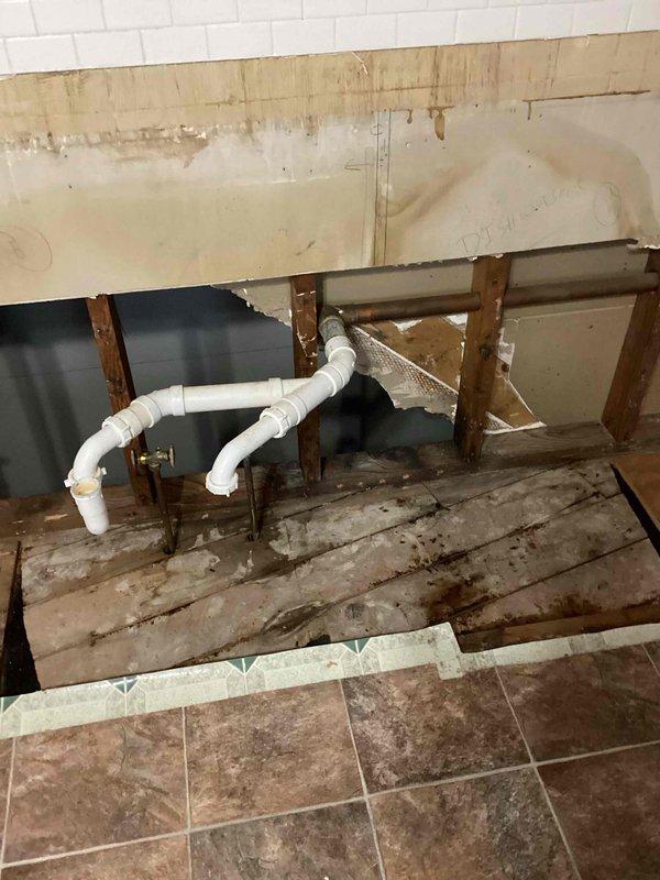 Responded to service call for a leaking faucet and sink drain. Upon assessment, discovered copper drain line leaking within wall requiring removal of damaged section. Installed new PVC drain line and stubbed out of wall for future connection. Additionally, replaced deteriorated hot and cold water shut-off valves with new units. Customer inquired about winterization options for future consideration.