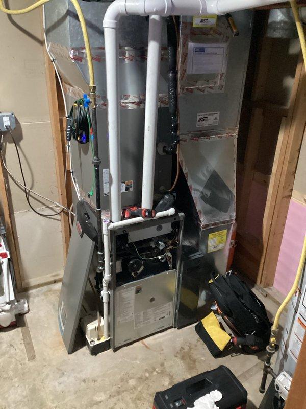 Performed annual furnace preventative maintenance tune-up on residential system. Inspected exterior exhaust and intake PVC piping for proper operation. Evaluated internal furnace components including control board, electrical connections, and blower wheel assembly. Successfully diagnosed and resolved persistent humming noise reported by homeowner.