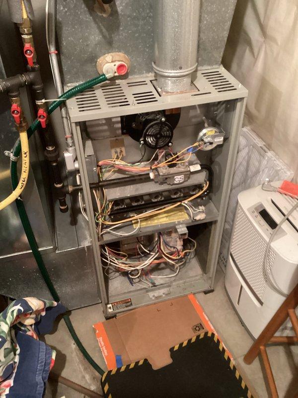 Responded to no heat complaint on older system. Diagnosed issue with high limit switch creating ground fault, causing system failure with error code on Nest thermostat. Performed adjustment to temporarily restore operation, but customer opted for replacement of limit switch due to age of unit.