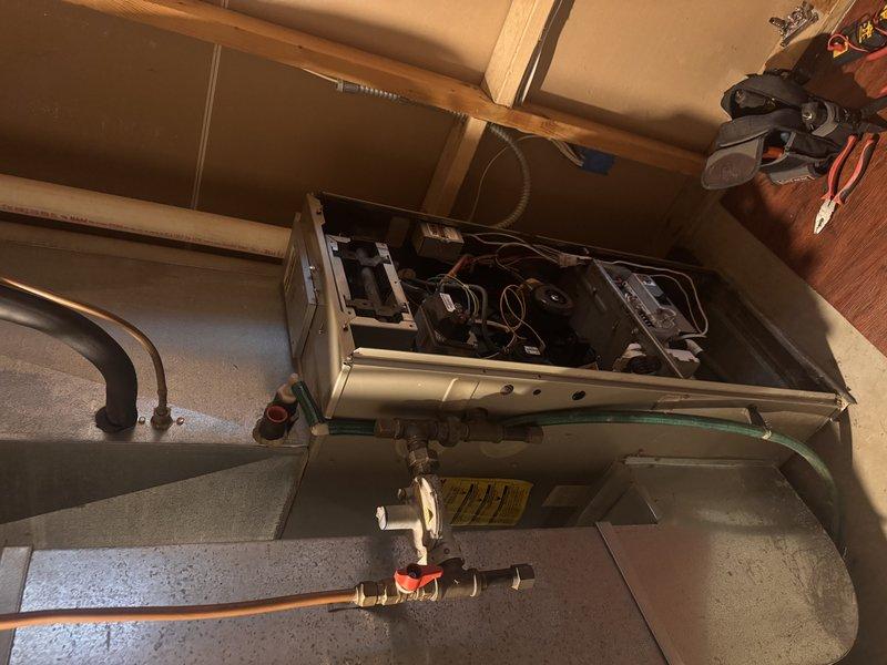 Responded to no heat call for an older furnace. Upon inspection, identified a failed inducer motor preventing normal operation. Presented customer with repair estimate and outlined replacement options. Took photos documenting the furnace condition including internal components and existing installation setup.