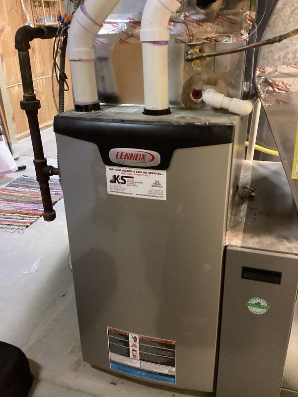 Performed scheduled preventive maintenance agreement service on Lennox HVAC system. Conducted comprehensive tune-up of furnace and associated components, inspecting ventilation connections with properly sealed PVC joints. System functioning normally with no issues identified.