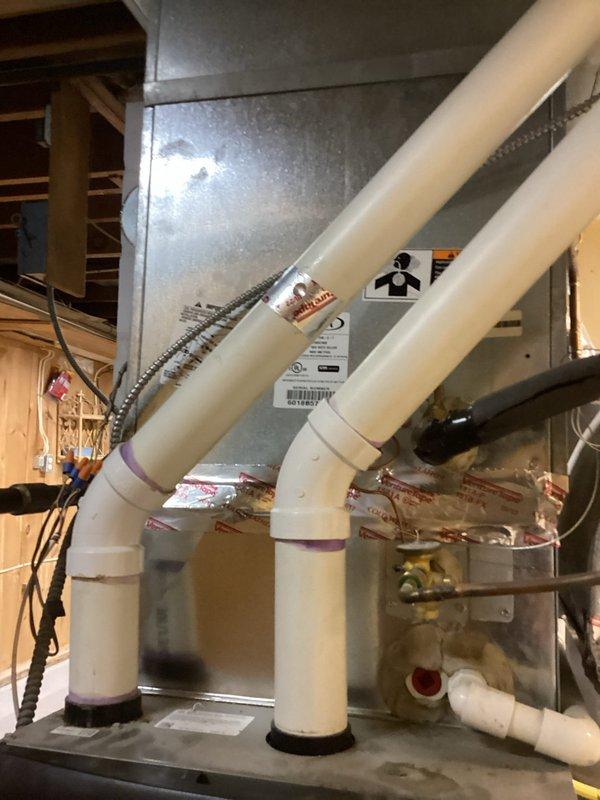 Performed scheduled preventive maintenance agreement service on Lennox HVAC system. Conducted comprehensive tune-up of furnace and associated components, inspecting ventilation connections with properly sealed PVC joints. System functioning normally with no issues identified.