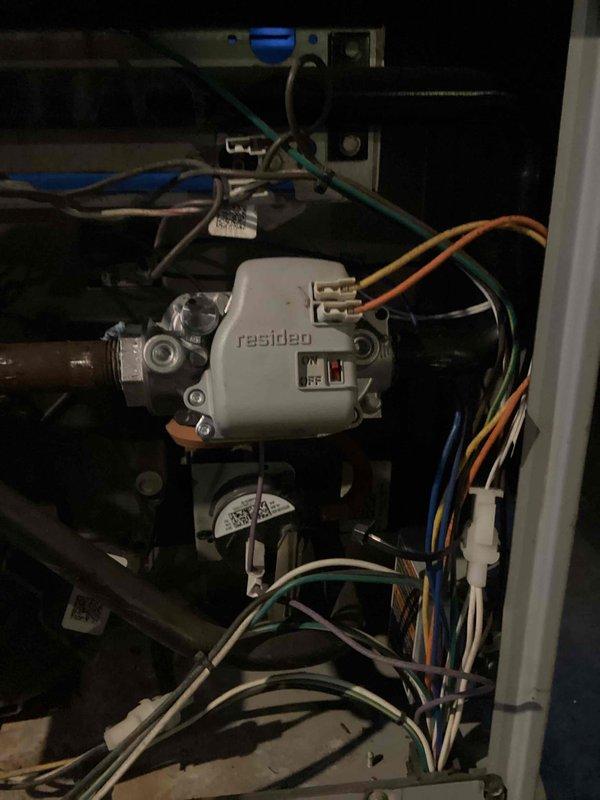 Responded to no-heat call for furnace less than 10 years old. Diagnostic testing revealed faulty gas valve preventing proper heating operation. Removed defective component and installed new Resideo gas valve, properly connecting all control wiring. System tested after repair and confirmed proper ignition and heat production.