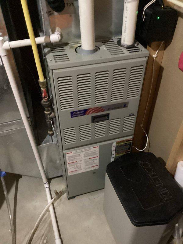 Performed scheduled tune-up maintenance on residential HVAC system per Agreement. Inspected furnace unit with PVC exhaust/intake pipes and associated ductwork. All components functioning properly; no issues identified during service.