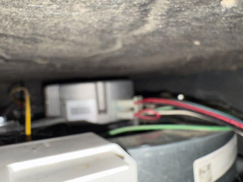 Responded to service call for insufficient heat where furnace was not maintaining thermostat temperature. Diagnostic inspection revealed a failed blower motor as the primary issue, evidenced by significant corrosion at burner assembly connections and electrical control system problems. Recommended replacement of motor or complete system due to component failure affecting heating performance.