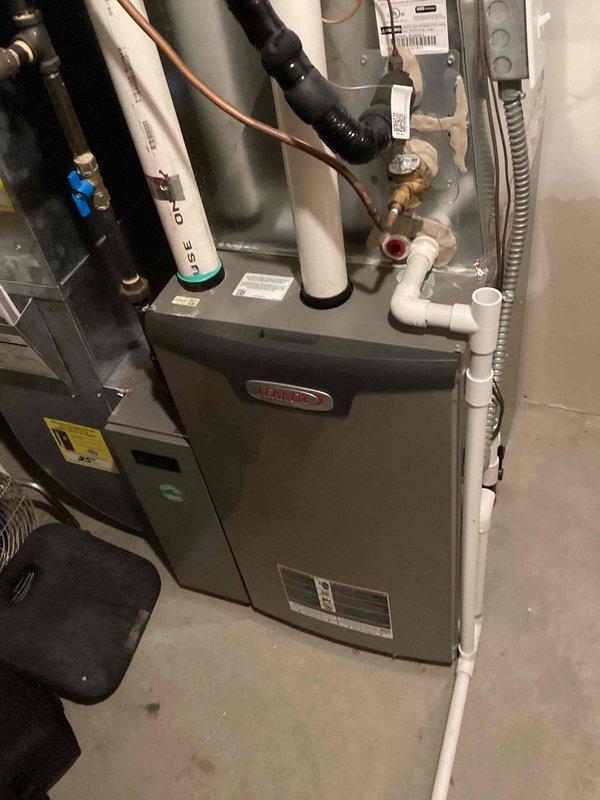 Performed scheduled maintenance agreement tune-up on Lennox residential HVAC system. Visual inspection of furnace, ductwork, and all connections (PVC venting pipes, drainage piping, and refrigerant lines) confirmed proper installation. System operating normally with no issues detected.