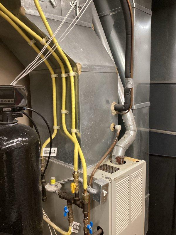 Responded to emergency no-heat call for older furnace system. Upon inspection, discovered severely clogged air filter restricting proper airflow. Replaced filter with customer-supplied replacement, which restored proper heat function. Noted existing quote for full system replacement due to unit age and condition.