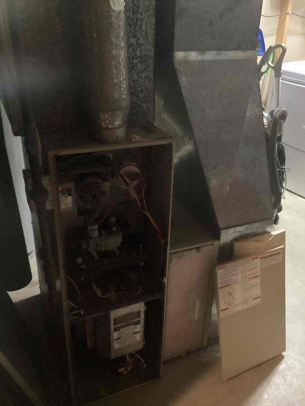 Responded to emergency no-heat call and diagnosed failed blower motor in aging furnace (10+ years). System inspection revealed the unit was at end of life with multiple wear indicators visible on internal components. Customer advised on replacement options and estimate appointment scheduled for new furnace installation.