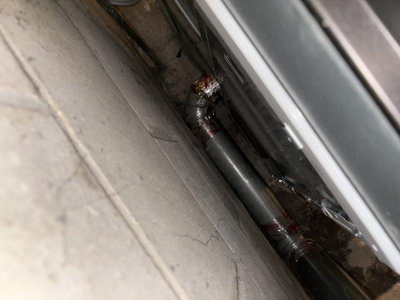 Responded to service call for disconnected dryer vent ductwork. Performed inspection and found previous repair had failed where duct tape was temporarily holding vent connection under the deck. Reconnected dryer venting properly and verified proper operation with functional test.