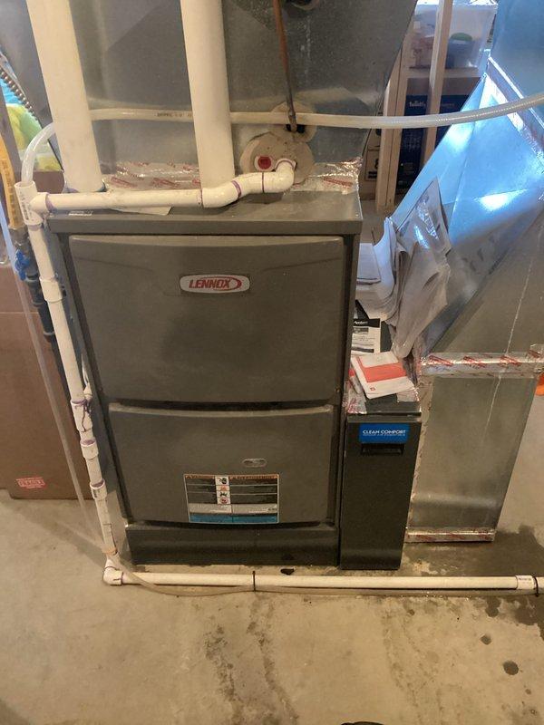 Responded to service call for leaking Lennox humidifier previously installed by our company. Upon inspection, determined excessive fan speeds and water pressure were causing the leak. Corrected issue by reducing fan speed settings and adjusting water pressure to appropriate levels. System is now operating properly with no leaks observed.