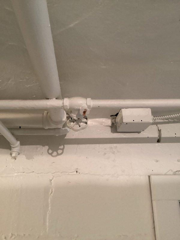 Responded to service call regarding leaking shut-off valve for exterior garden hose. Identified defective 1/2" threaded galvanized gate valve on the outside faucet line. Remedied by cutting out the compromised galvanized pipe section and installing new ball valve. System tested after repair with positive results - no leaks detected and proper water flow restored.