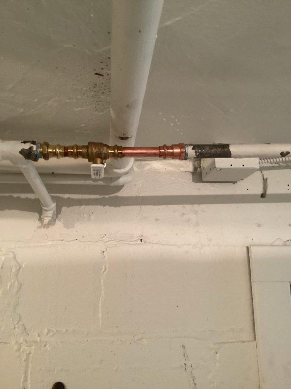 Responded to service call regarding leaking shut-off valve for exterior garden hose. Identified defective 1/2" threaded galvanized gate valve on the outside faucet line. Remedied by cutting out the compromised galvanized pipe section and installing new ball valve. System tested after repair with positive results - no leaks detected and proper water flow restored.