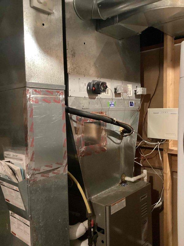 Arrived and completed the sold repair which included removal of the existing humidifier and installation of a zone motor in the basement. All necessary parts were installed according to specifications, and the system was verified to be functioning properly upon completion.