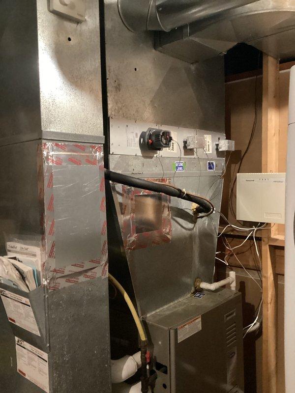 Arrived and completed the sold repair which included removal of the existing humidifier and installation of a zone motor in the basement. All necessary parts were installed according to specifications, and the system was verified to be functioning properly upon completion.