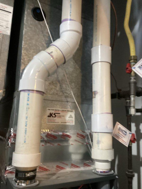 Performed scheduled air handler tune-up service that had been previously rescheduled once. Completed full system inspection with documentation of equipment identification tags. Checked and inspected condensate drain system components, verifying proper installation of PVC piping and connections. All systems functioning normally; no issues identified.