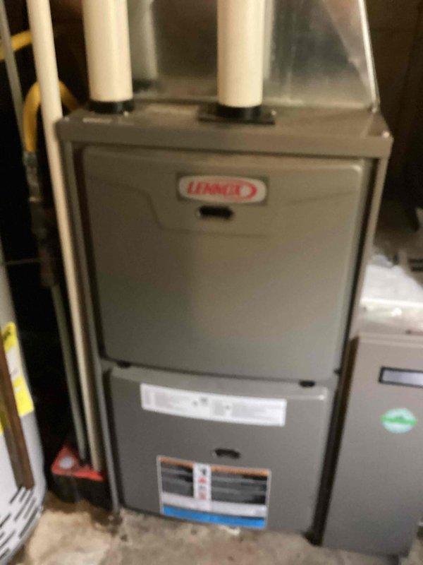 Performed scheduled maintenance agreement service on Lennox heating system. Conducted comprehensive tune-up of furnace unit with proper inspection of PVC exhaust/intake piping and drainage connections. All systems functioning normally after service completion.