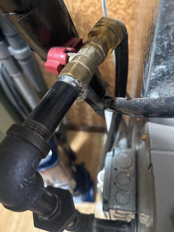 Responded to a report of a propane odor at customer's residence. Upon inspection, identified a gas leak on the outlet side of the 1/2" gas shut off valve. Replaced affected section of black iron fittings to resolve the leak and restore safe system operation.