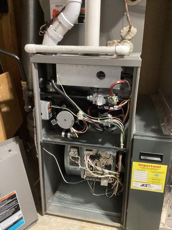Performed scheduled preventive maintenance agreement service on residential HVAC system. Inspected furnace internals including blower motor, electrical connections, circuit board components, and PVC ventilation system. All components found in normal working condition with no issues identified.