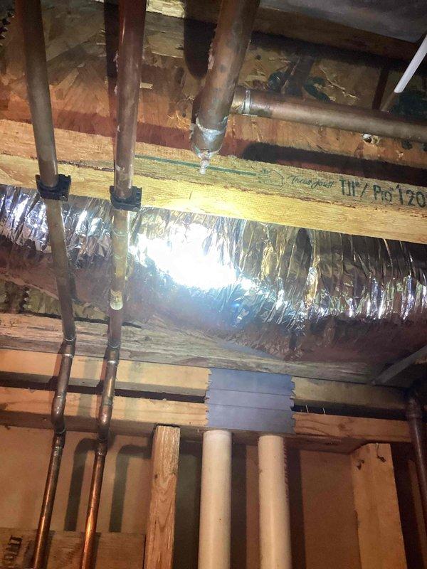 Performed warranty inspection for reported water heater leak at piping joint installed within past 30 days. Determined issue was not a leak but normal condensation forming where cold water inlet line runs adjacent to power vent, causing moisture when heater operates. No repair needed; A.O. Smith water heater functioning properly. Customer advised to monitor the progress joint and report if actual leakage occurs.