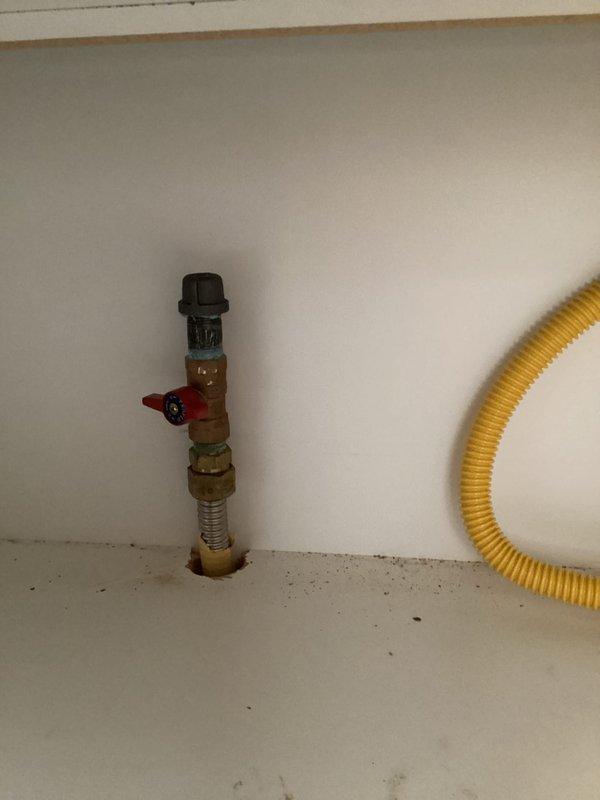 Responded to service call to cap gas line for kitchen stove conversion to electric appliance. Successfully disconnected and safely capped the existing gas supply line to stove using appropriate brass fittings. Verified installation with pressure test to ensure proper seal and no gas leaks at the connection point.