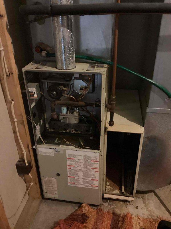 Responded to no heat call for aging furnace system. Diagnosed seized blower motor as cause of system failure. Customer opted to pursue furnace replacement rather than repair of existing unit.