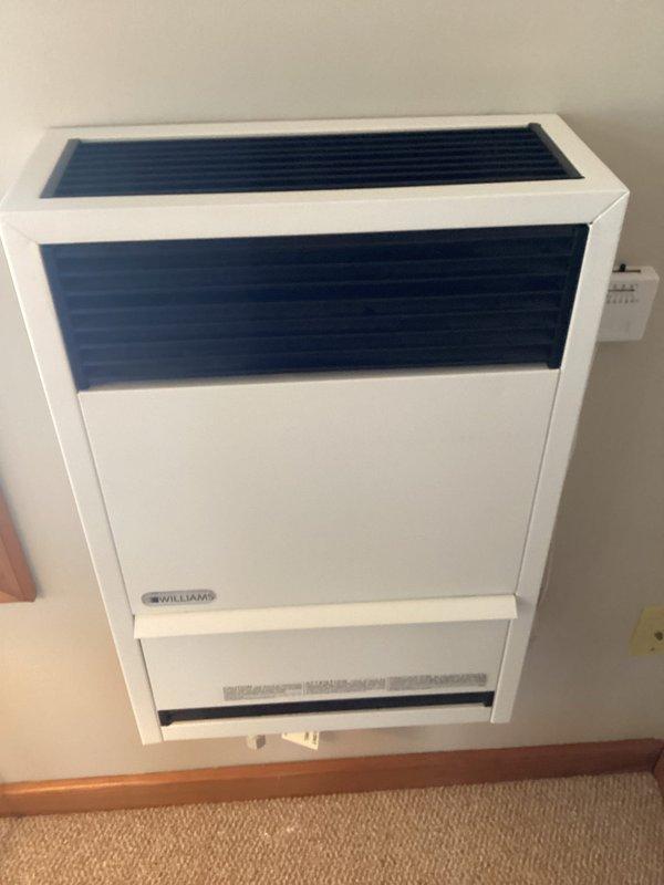 Arrived at 12-4 and installed a thermocouple for a Williams wall-mounted heating unit. Unit was properly mounted and appears in good working condition with all components functioning as intended after service completion.