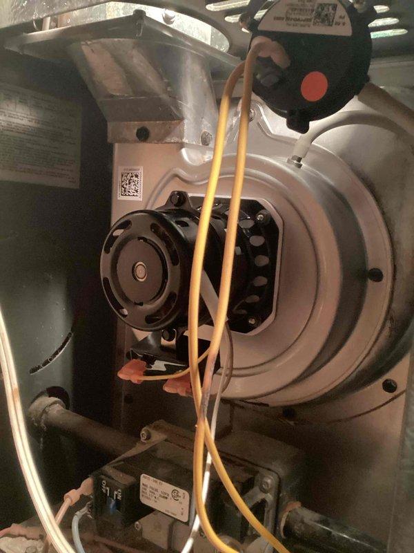 Responded to no-heat call for aging system (10+ years). Diagnosed failing draft inducer motor as evidenced by inspection of blower assembly. Installed new draft inducer per approved bid, verified proper operation of the system, and restored heating functionality.