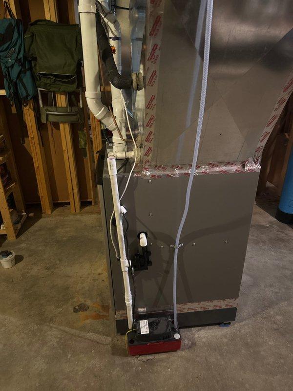 Installed warranty heat exchanger on furnace unit with proper pitch and added condensate pump to ensure proper drainage. All installation work completed; electrician scheduled separately to wire furnace outlet.